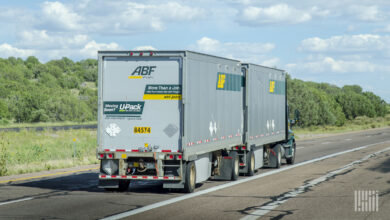 An ABF tractor pulling two ABF LTL trailers