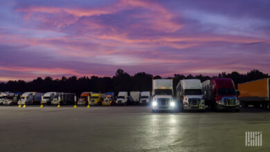 Trucks at rest stop at night.