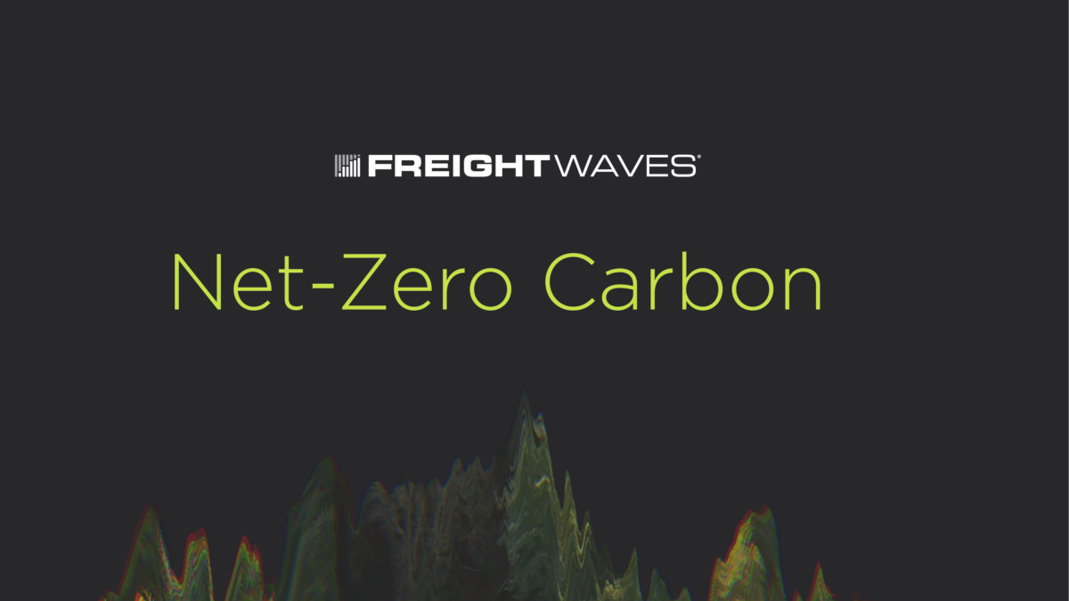 A logo for FreightWaves' Net-Zero Carbon show has a black background with green trees.